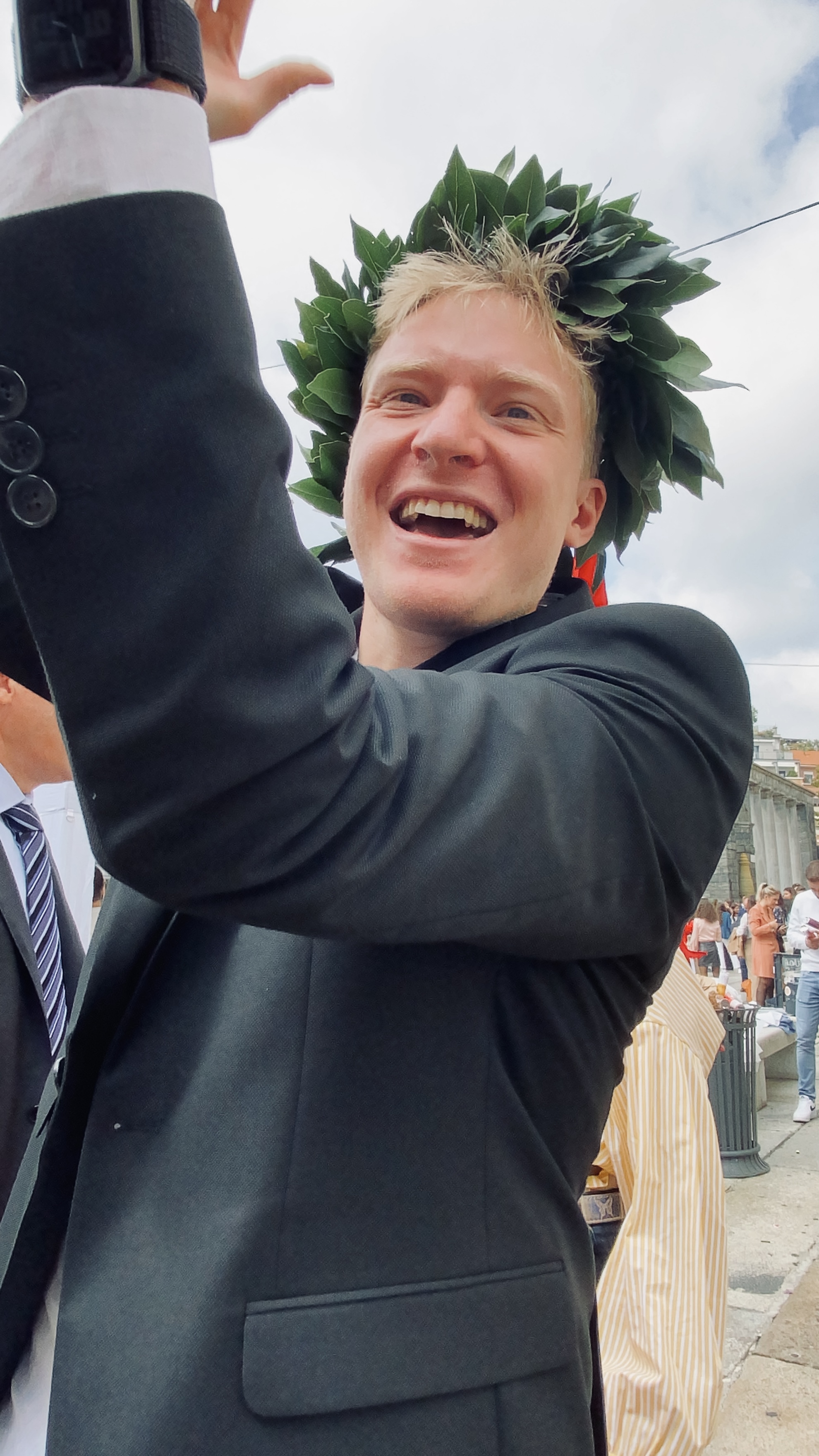 Gabriele Tealdo celebrating his Bachelor&rsquo;s graduation in Psychology, wearing the laurel wreath